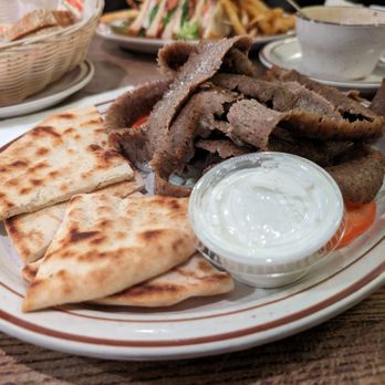 Salonica Restaurant signature dishes Gyros Plate
Greek Salad
Souvlaki